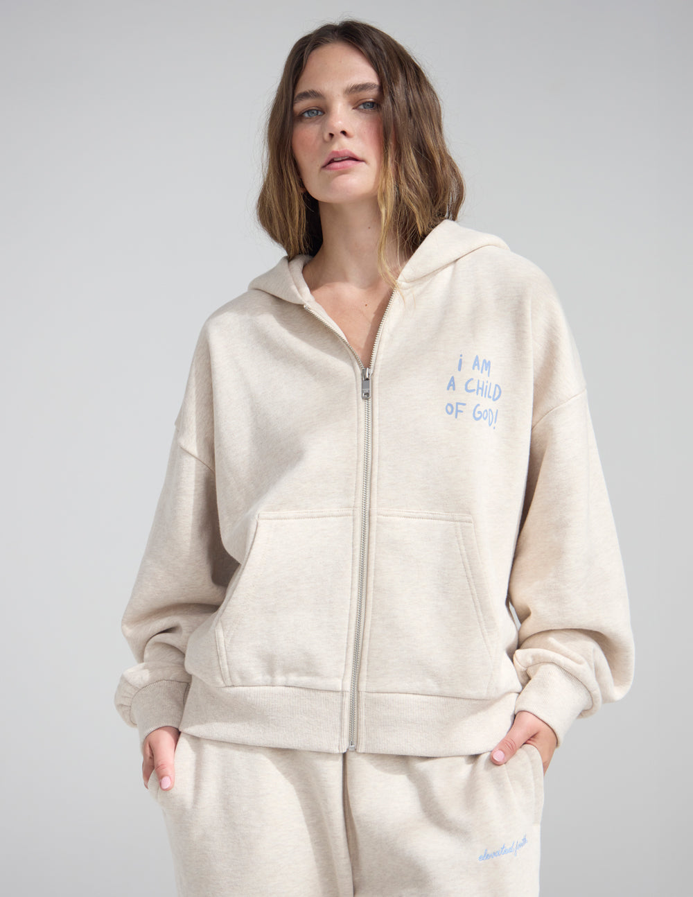 Eggshell full-zip hoodie with front zipper and chest logo print