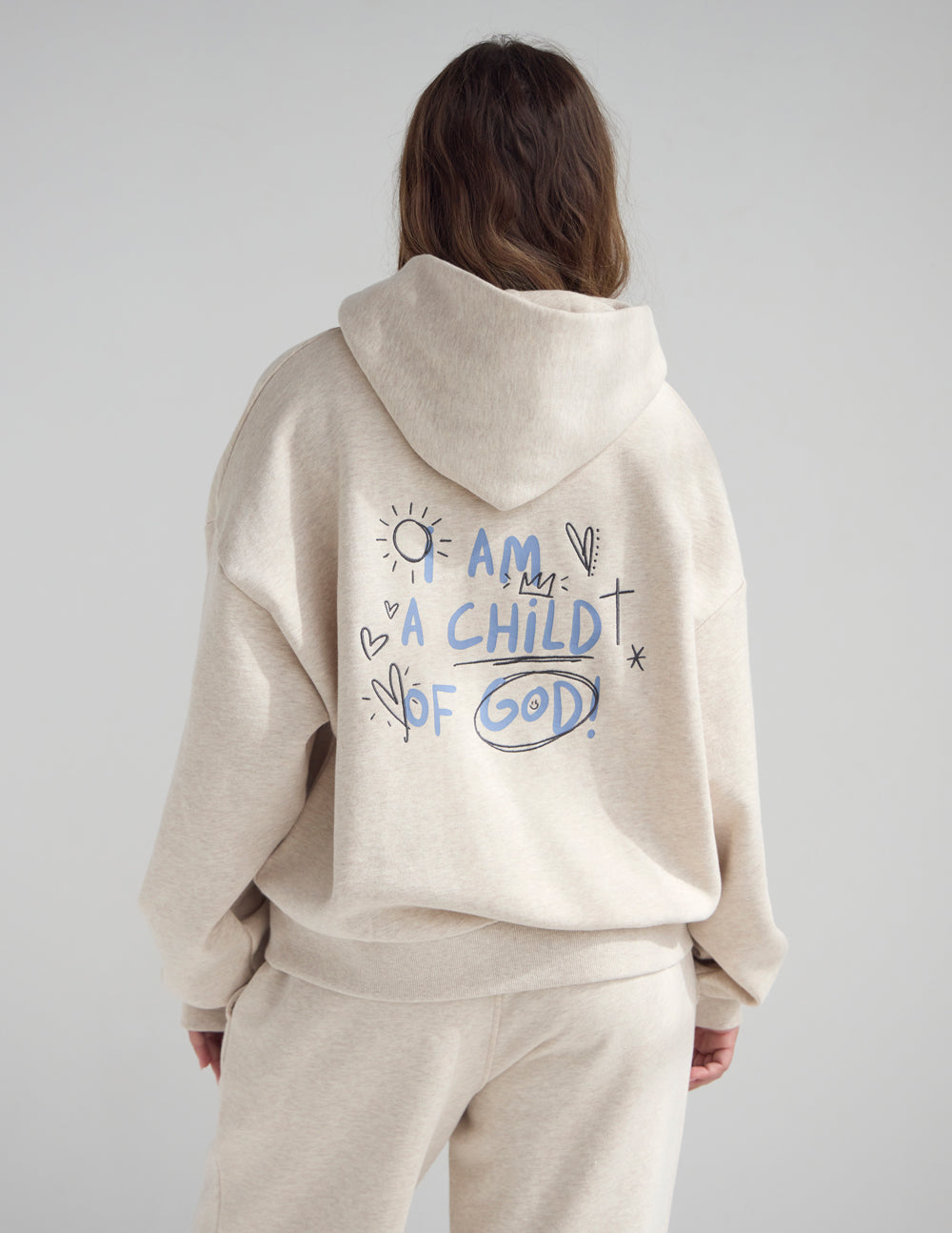 Eggshell full-zip hoodie with back graphic text