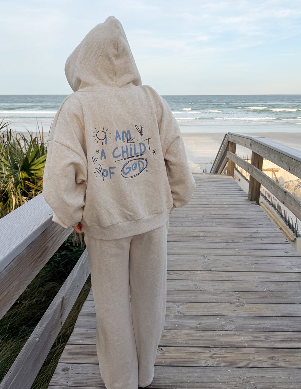 Eggshell full-zip hoodie with back graphic, hood up