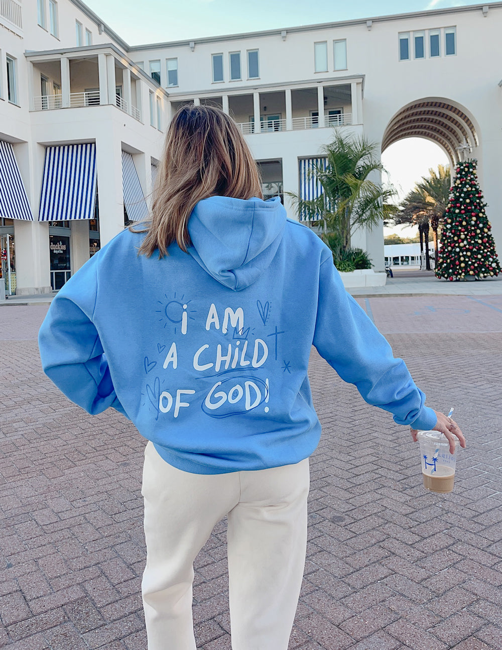 Light blue unisex hoodie, back graphic with drawstring hood