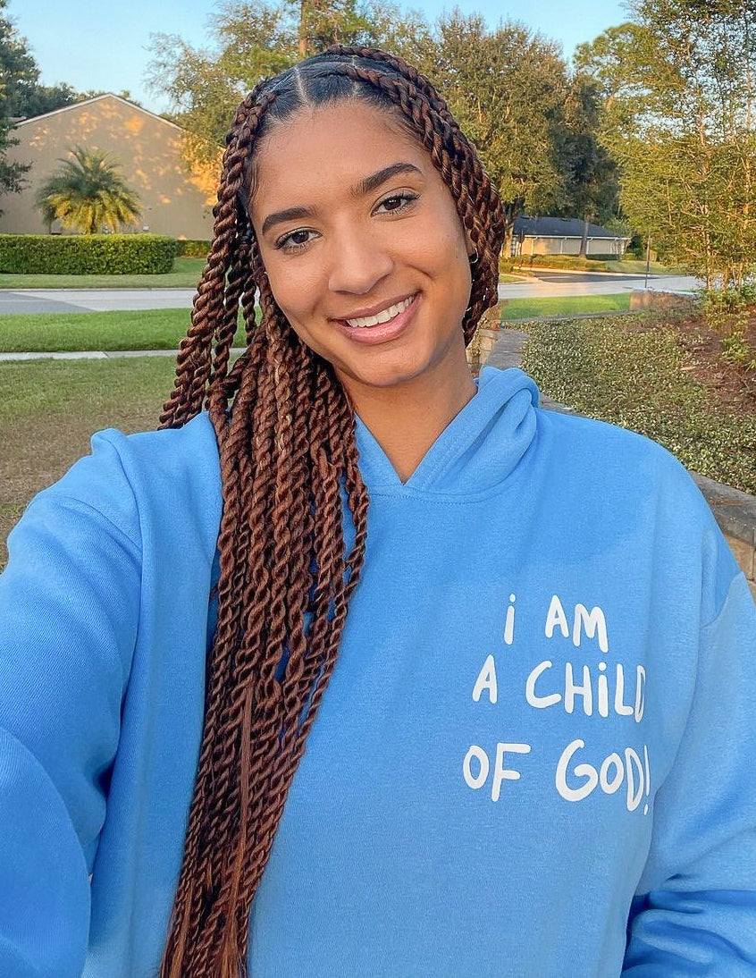 Light blue unisex hoodie with chest print 'I Am A Child of God'