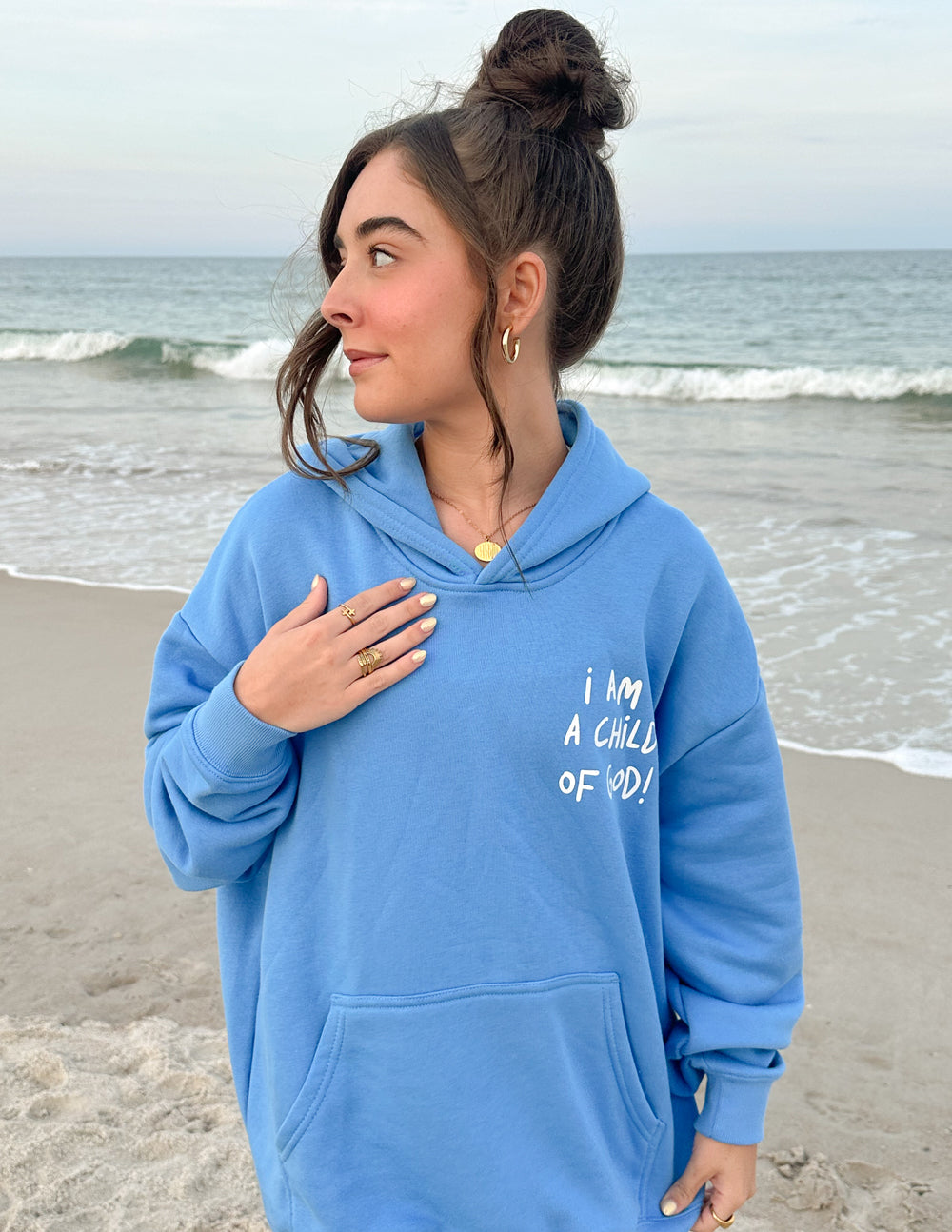 Light blue unisex hoodie with 'I Am A Child of God' chest print
