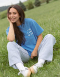 Blue unisex T-shirt with front text print and heart accents