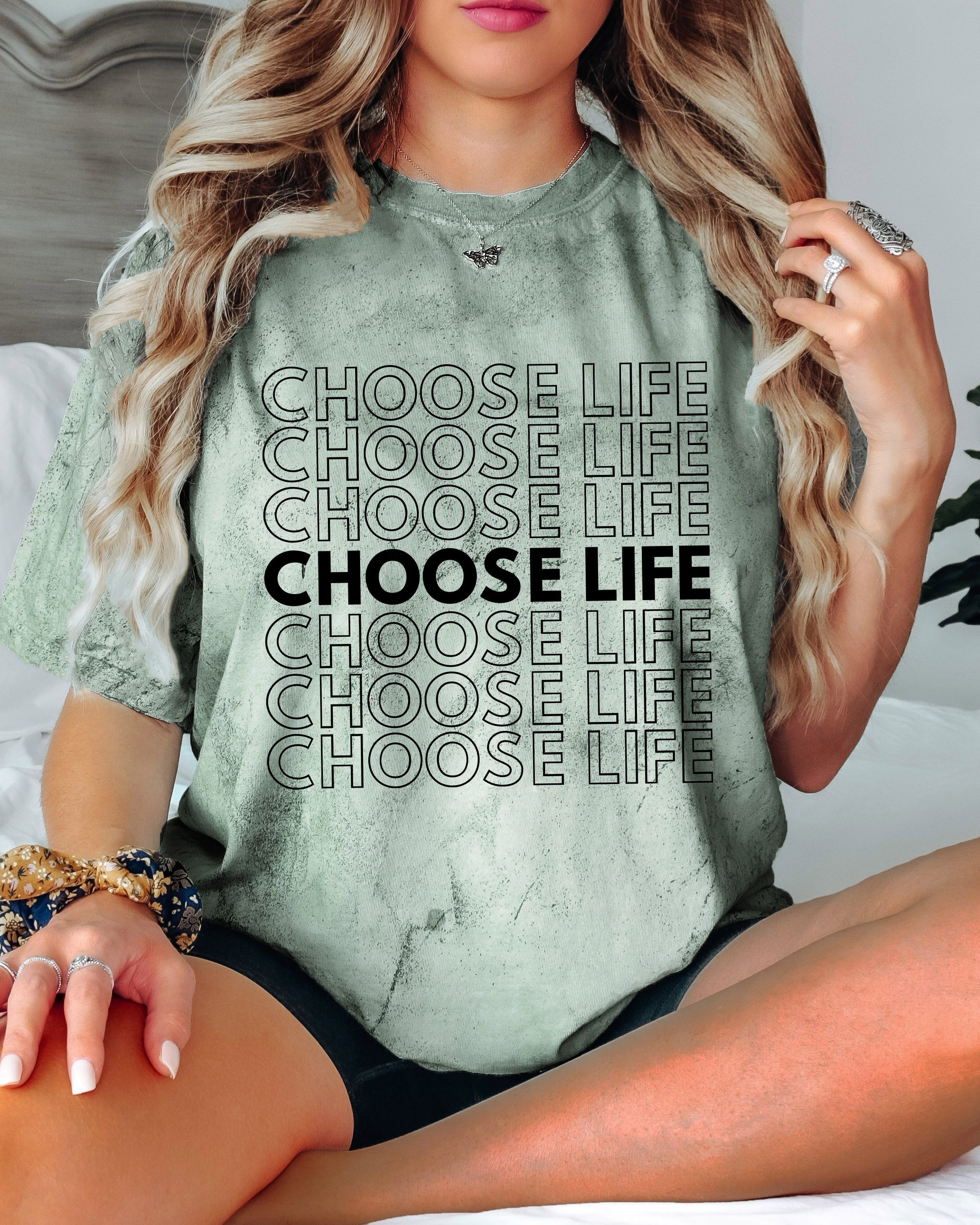Faded green unisex T-shirt with stacked 'CHOOSE LIFE' text graphic