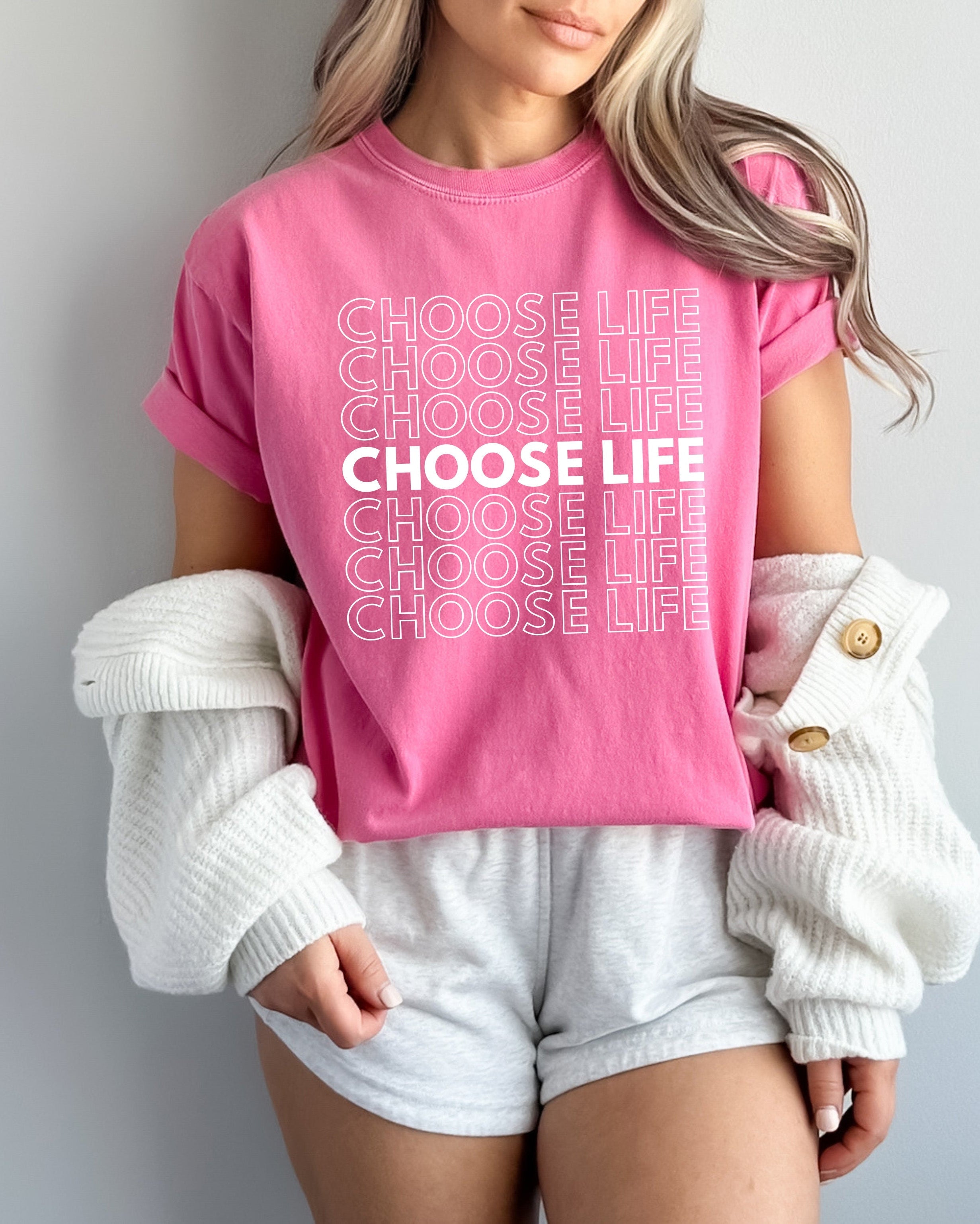 Pink unisex T-shirt with stacked 'CHOOSE LIFE' text graphic