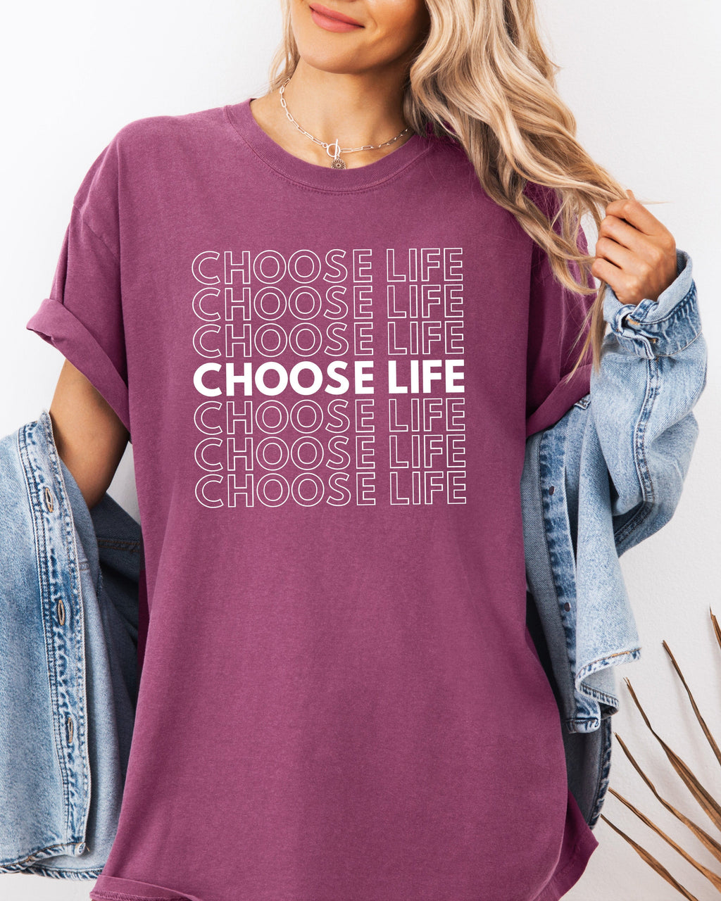 Plum purple Christian t-shirt with “CHOOSE LIFE” text graphic on the front.