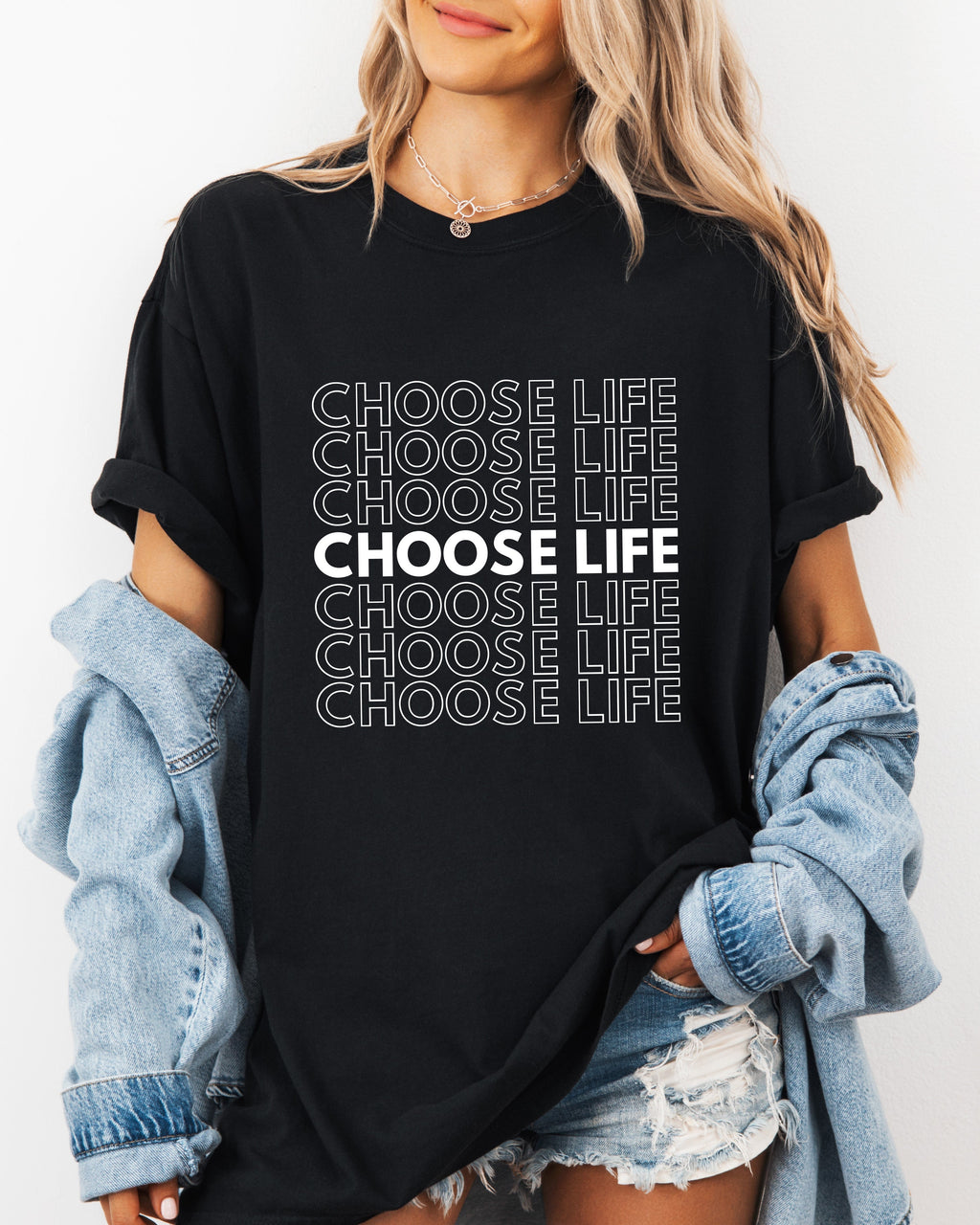 Black Christian t-shirt with “CHOOSE LIFE” text graphic on the front.