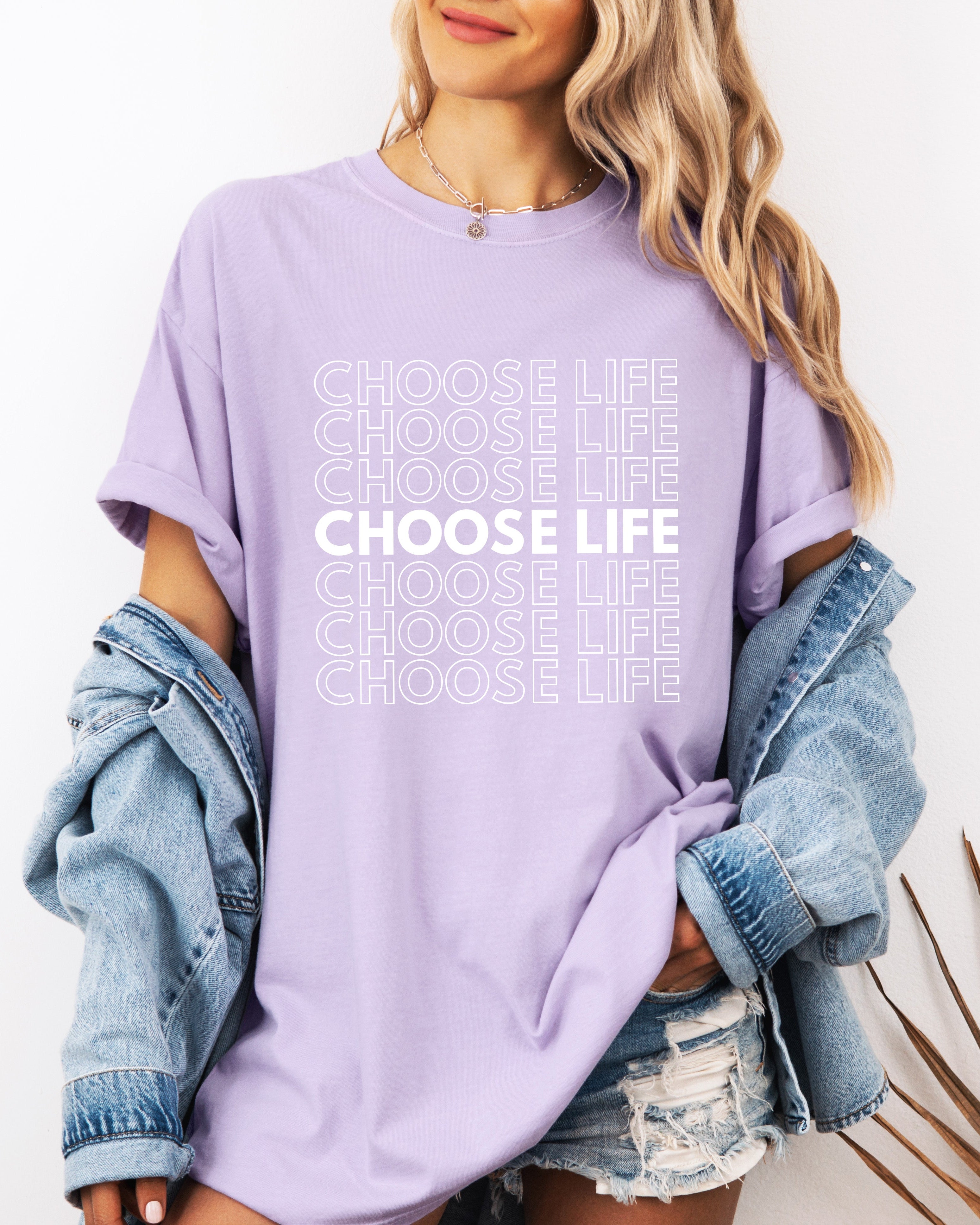 Light lavender Christian t-shirt with “CHOOSE LIFE” text graphic on the front.