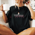 Women's black Halloween T-shirt with pumpkin spice and spirit of Christ graphic