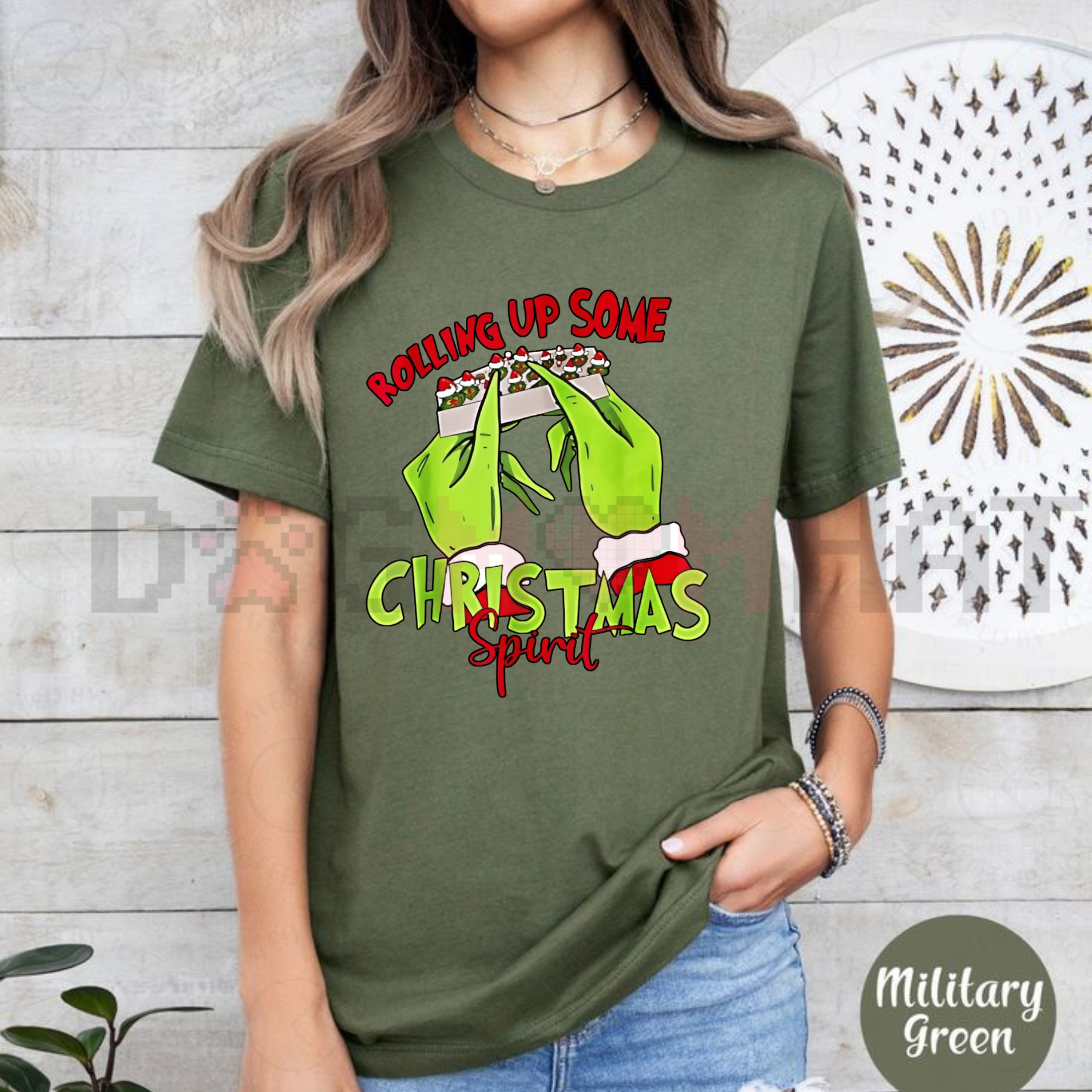 Military green T-shirt with Grinch hands Christmas graphic, crew neck short sleeves