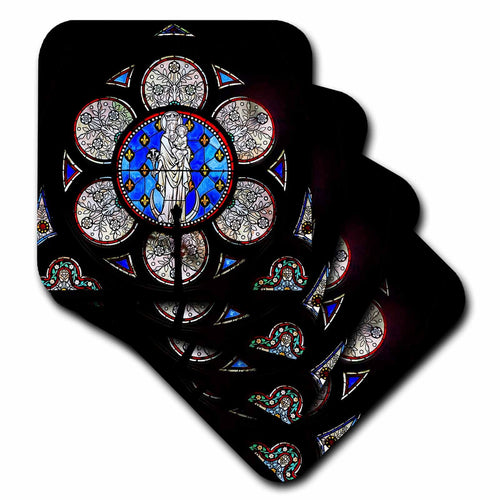 Coasters with stained-glass window art, blue figure details on dark