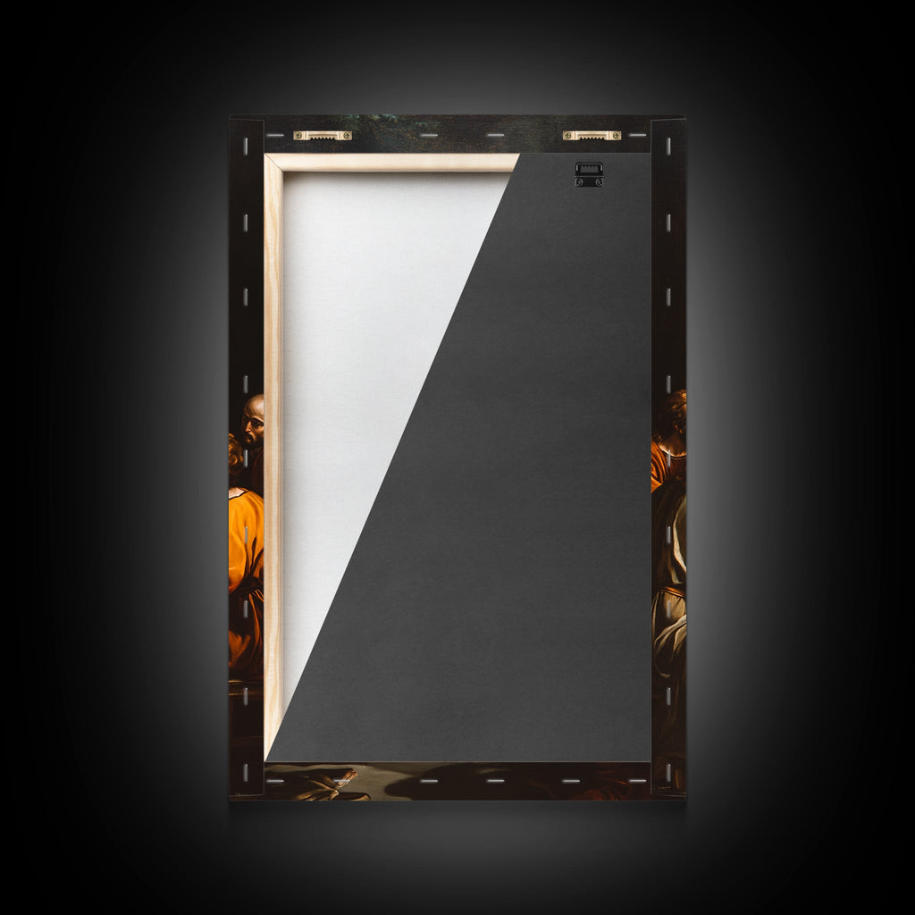 Backside of framed canvas wall art with mounting hardware and border edge