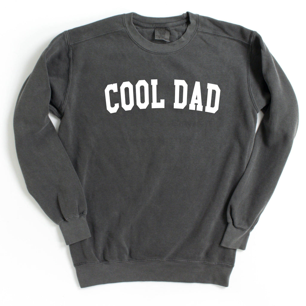 Dark gray crewneck sweatshirt with white “COOL DAD” print