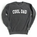 Dark gray crewneck sweatshirt with white “COOL DAD” print