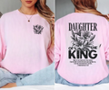 Pink long sleeve tee with small front floral graphic at the chest and round neckline