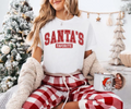 White Santa's Favorite graphic tee with red lettering