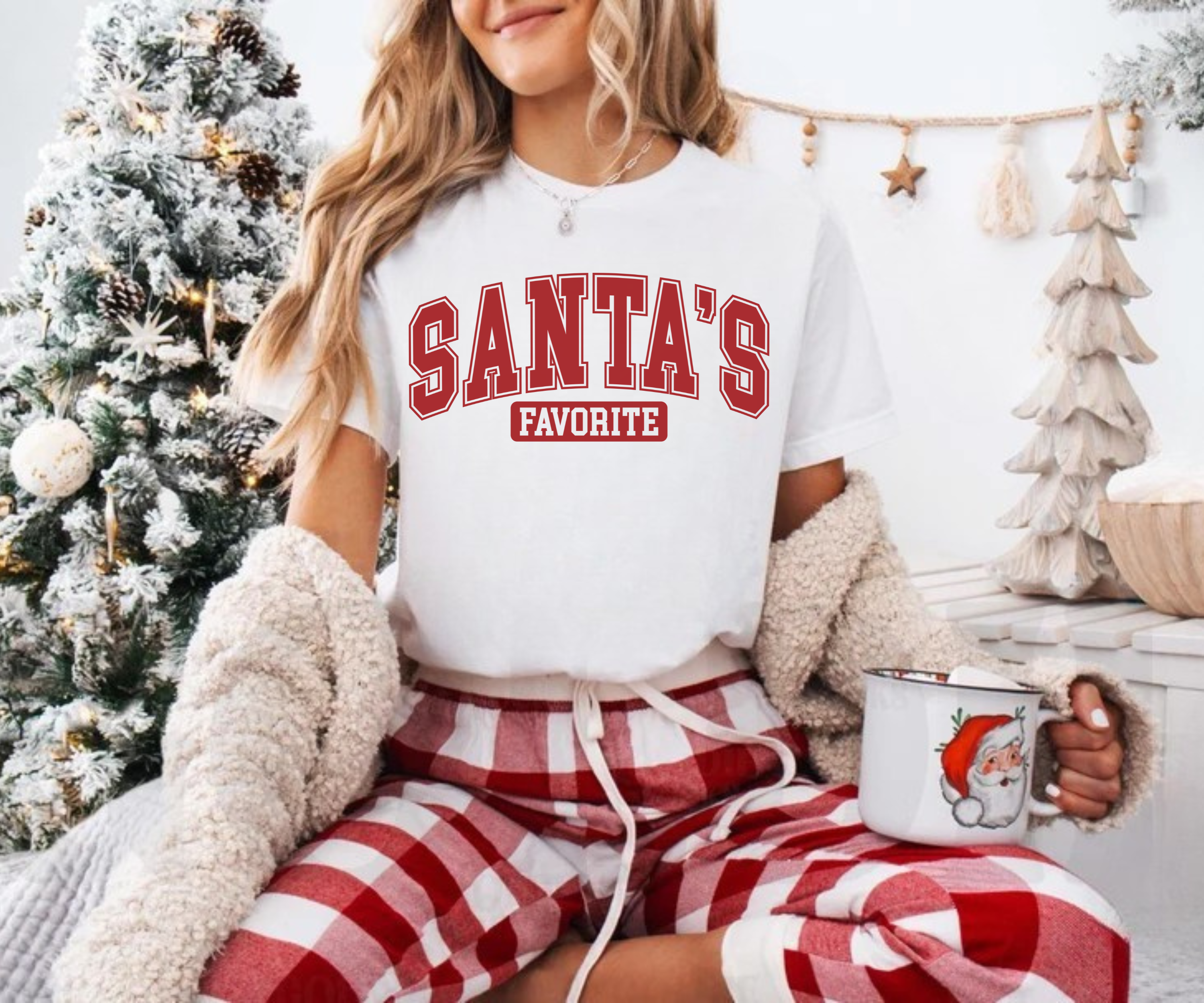 White Santa's Favorite graphic tee with red lettering