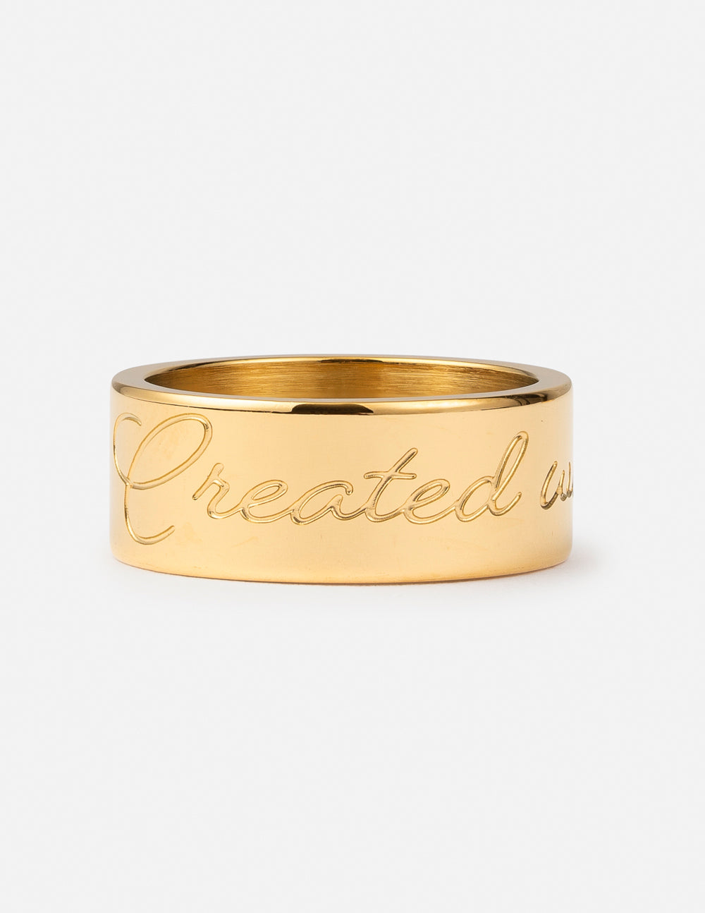 Gold band ring with engraved script on front, smooth domed profile
