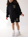 Kids dark shorts with drawstring waist and Created by the Creator logo