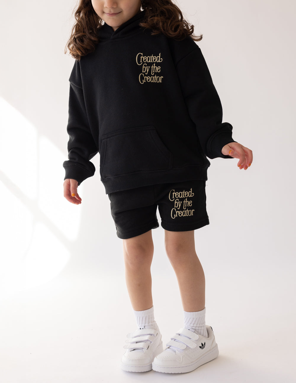 Kids dark shorts with drawstring waist and Created by the Creator logo