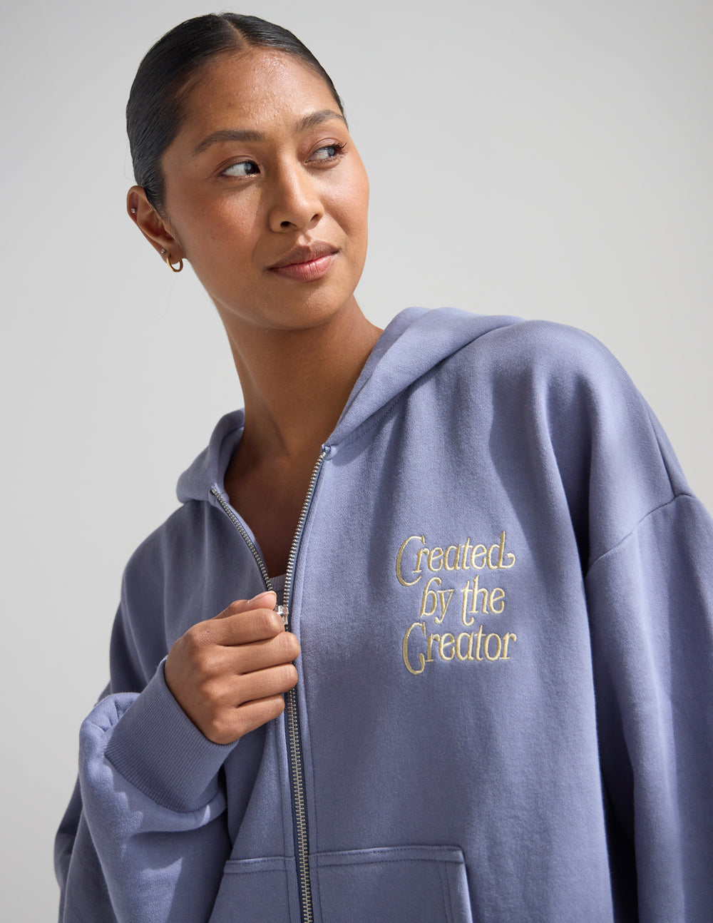Lavender full-zip hoodie with front logo and metal zipper