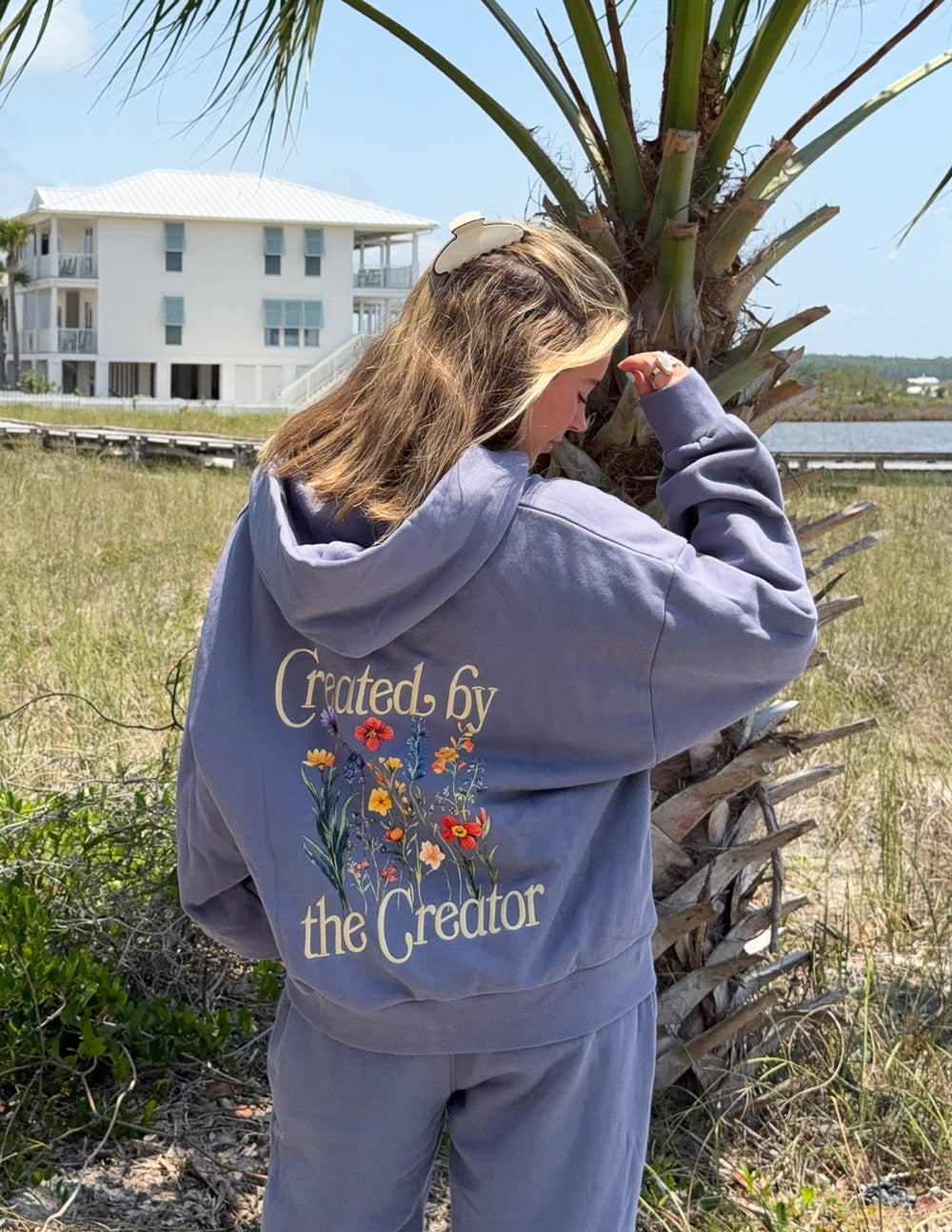 Lavender full-zip hoodie with back floral logo