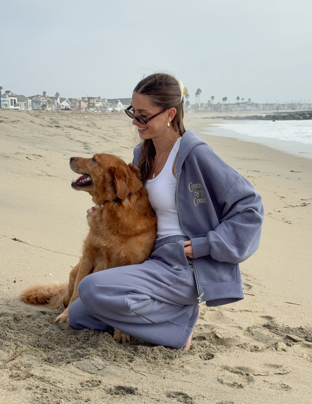 Lavender full-zip hoodie with front logo and metal zipper