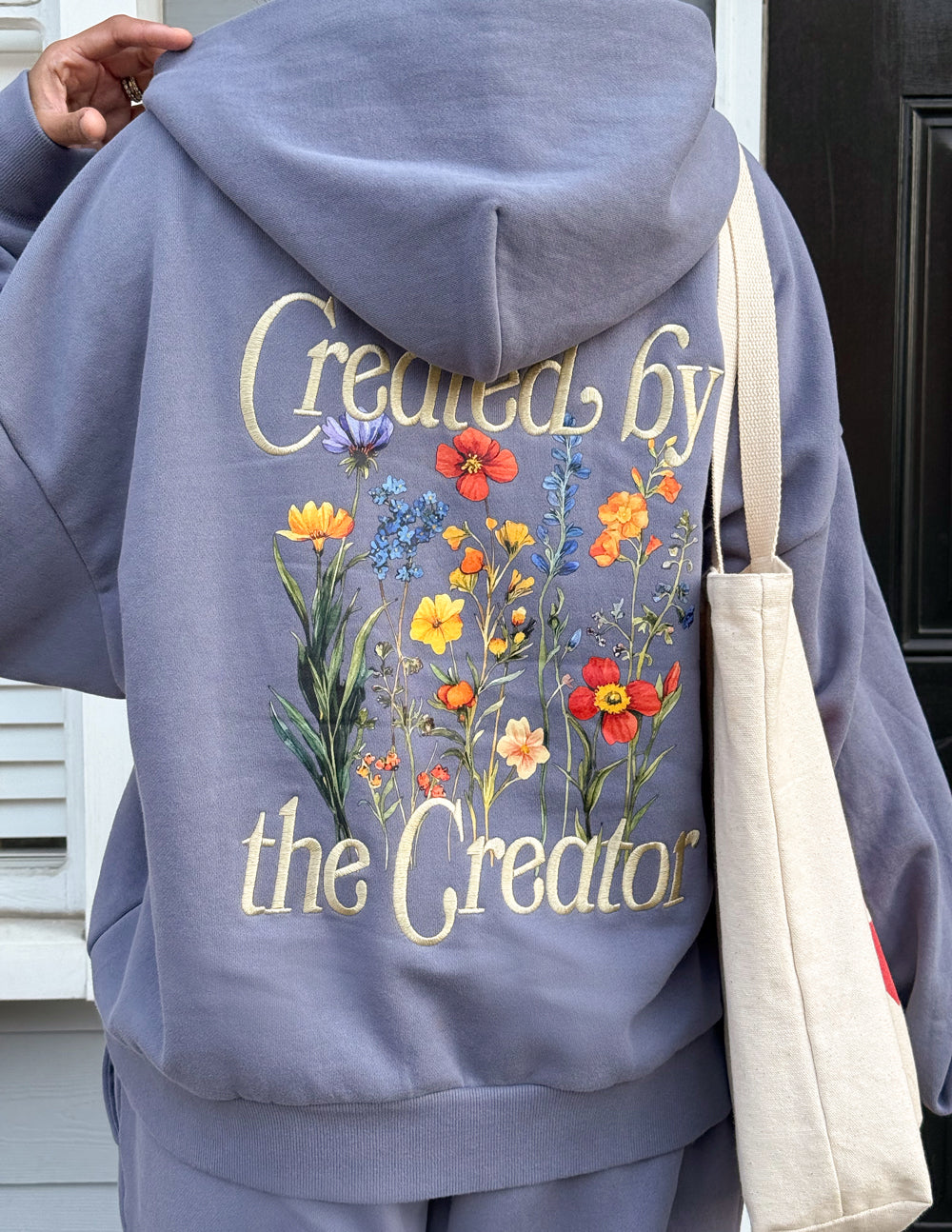 Lavender full-zip hoodie back graphic with flowers and script text