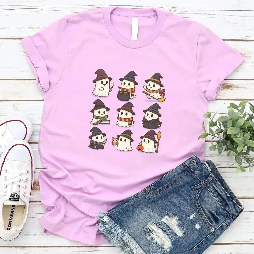Lilac Halloween T-shirt featuring a grid of cute witch-and-ghost cartoon figures