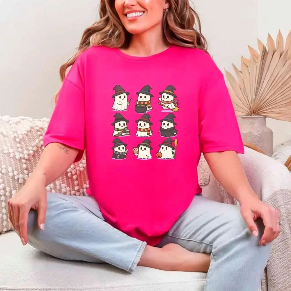 Fuchsia pink Halloween T-shirt with cute witch and ghost cartoon graphic on front