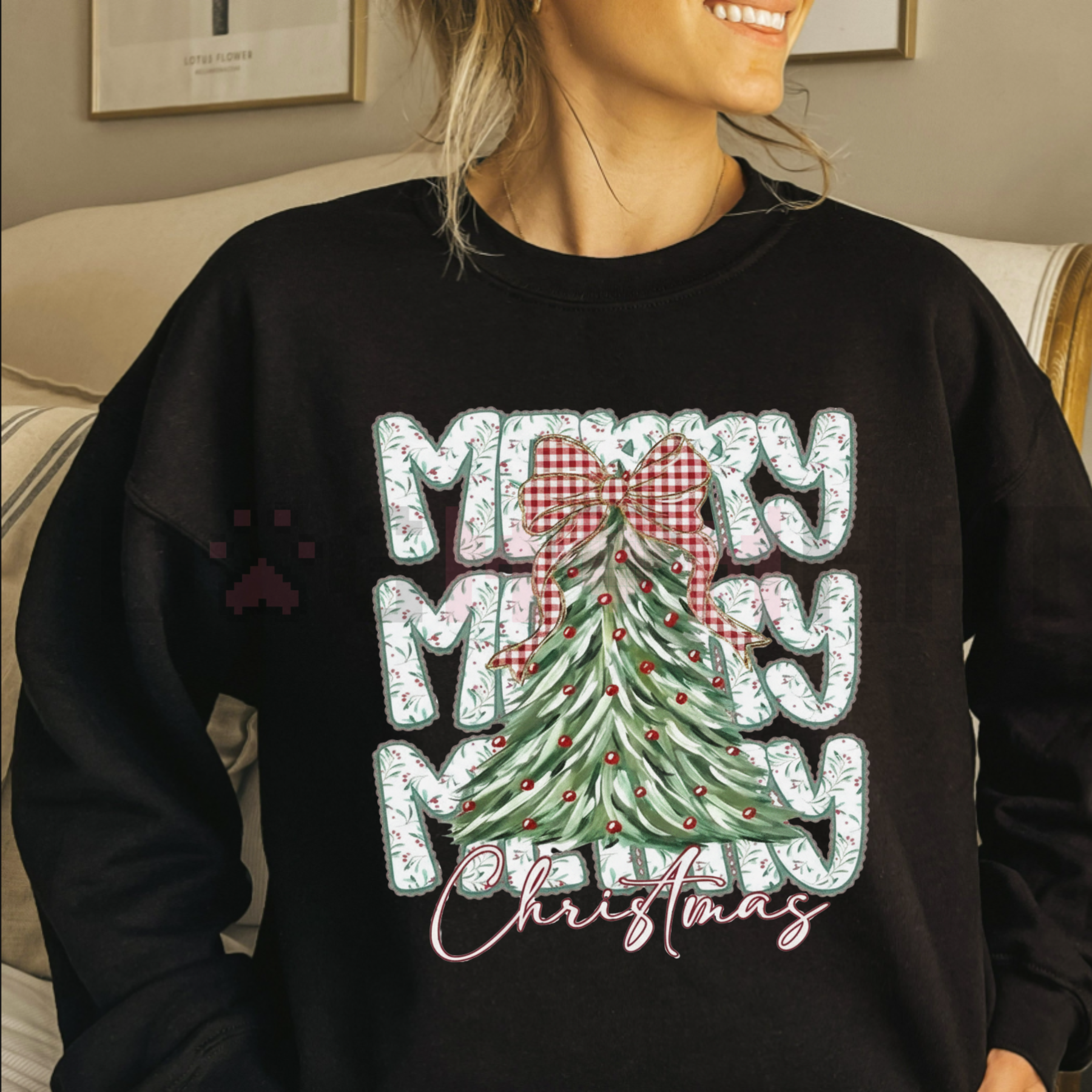 Black crewneck sweatshirt with Christmas tree graphic and bow, long sleeves