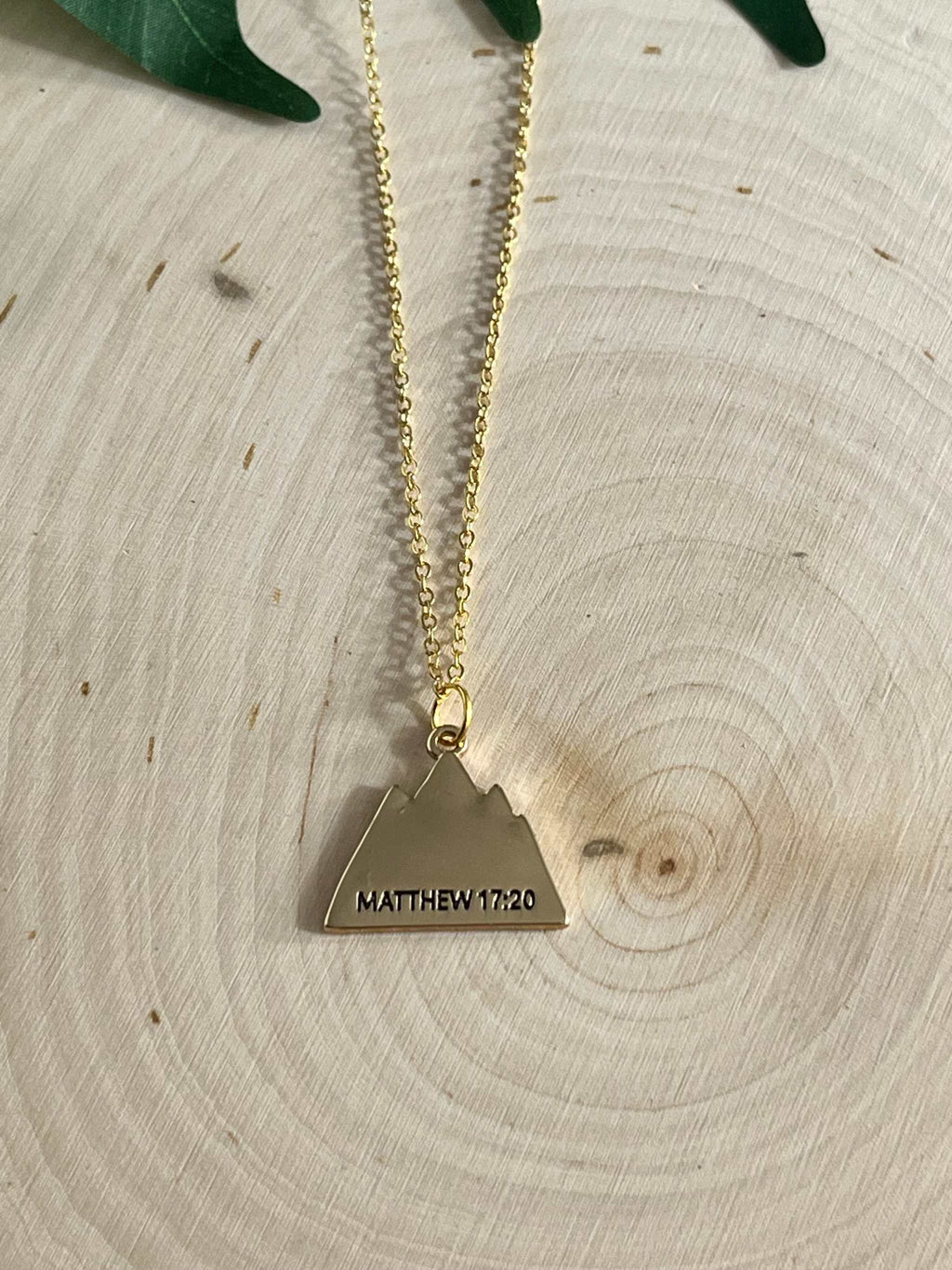 Gold chain necklace with large heart pendant engraved with Matthew 17:20