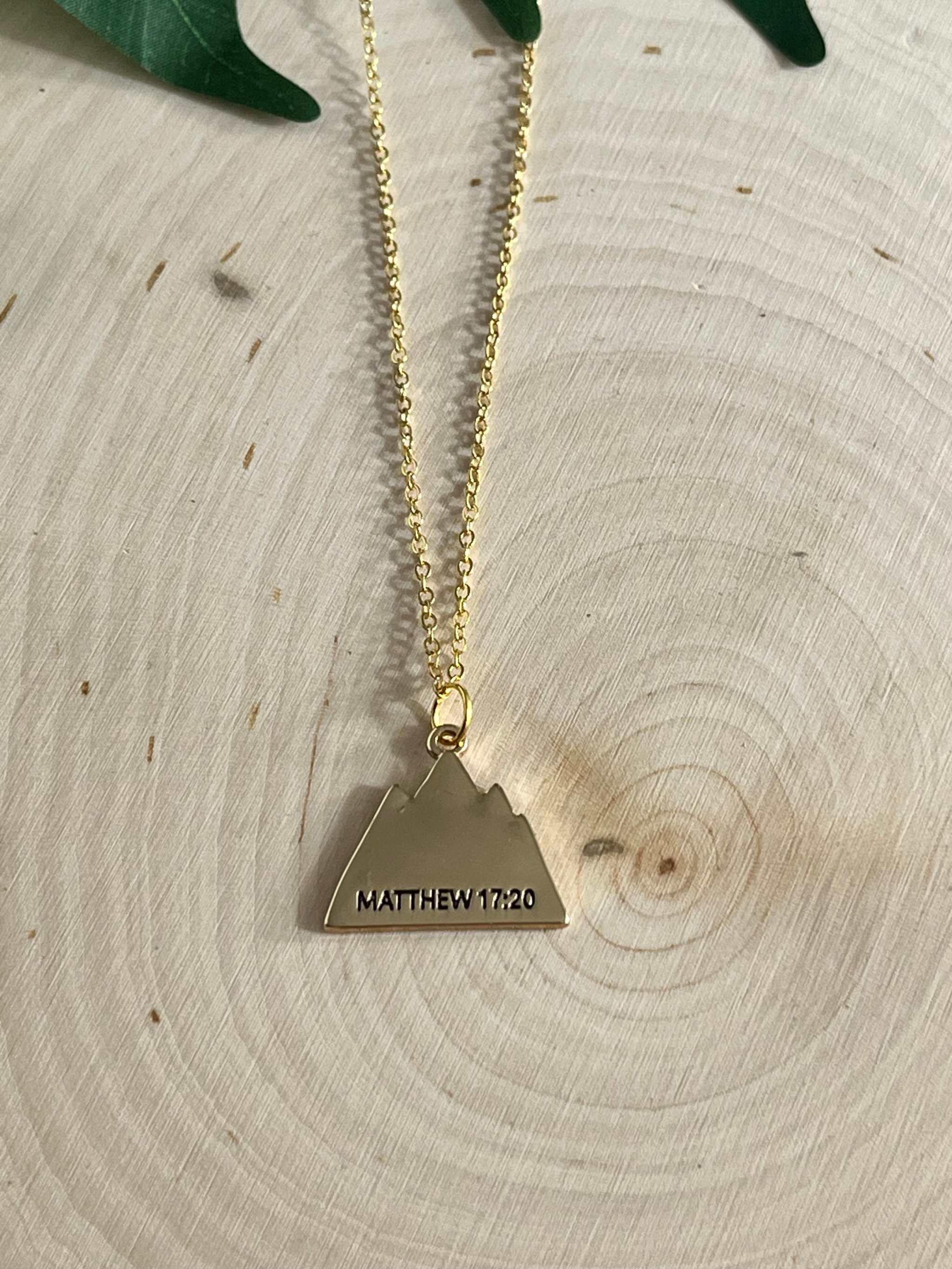 Gold chain necklace with large heart pendant engraved with Matthew 17:20