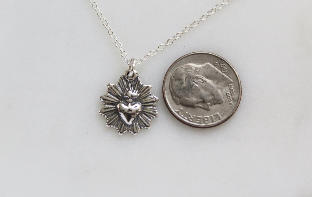 Oxidized silver heart pendant necklace with round scalloped charm