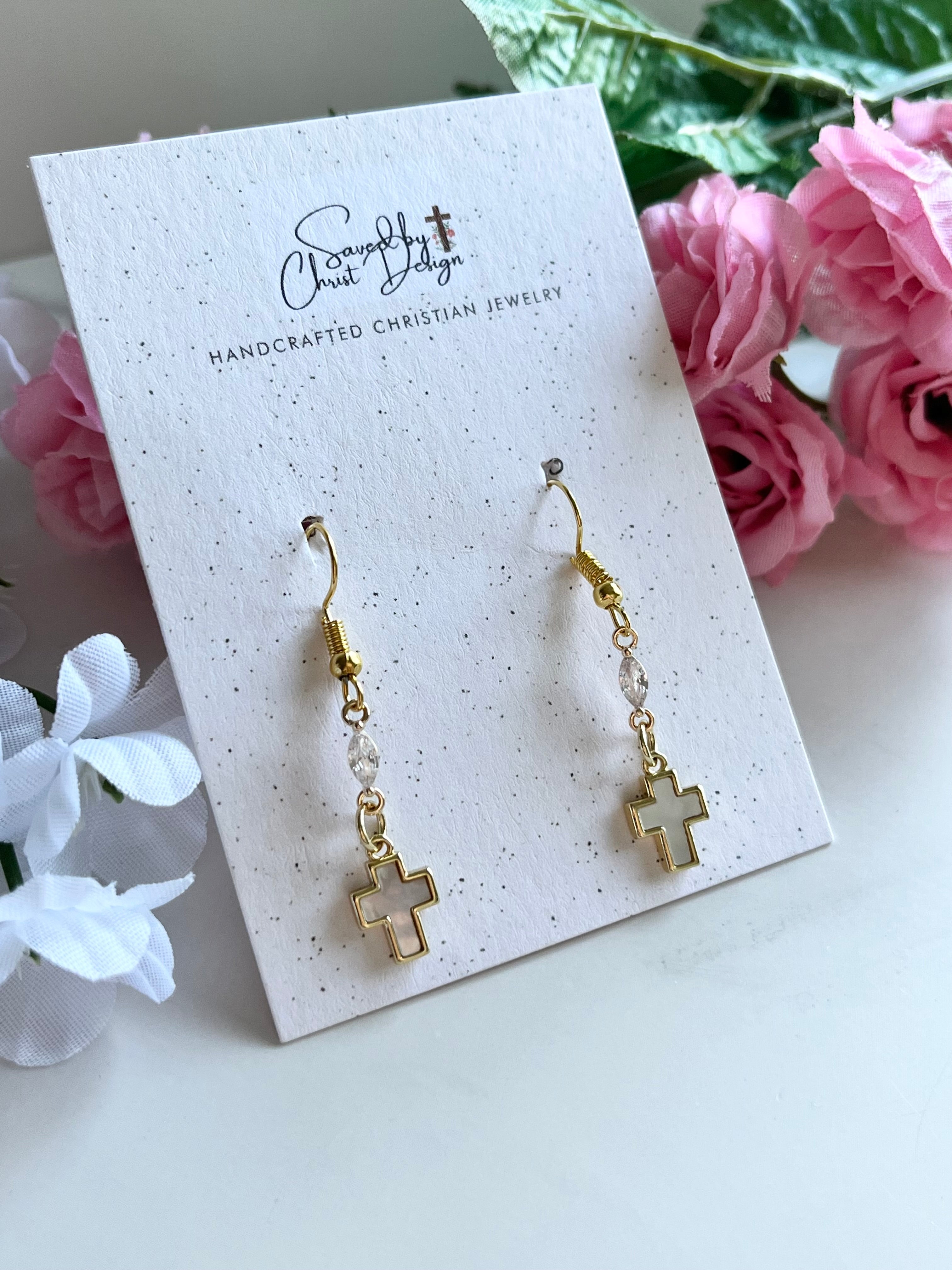 Gold-tone cross drop earrings with bead links and a hanging cross charm.