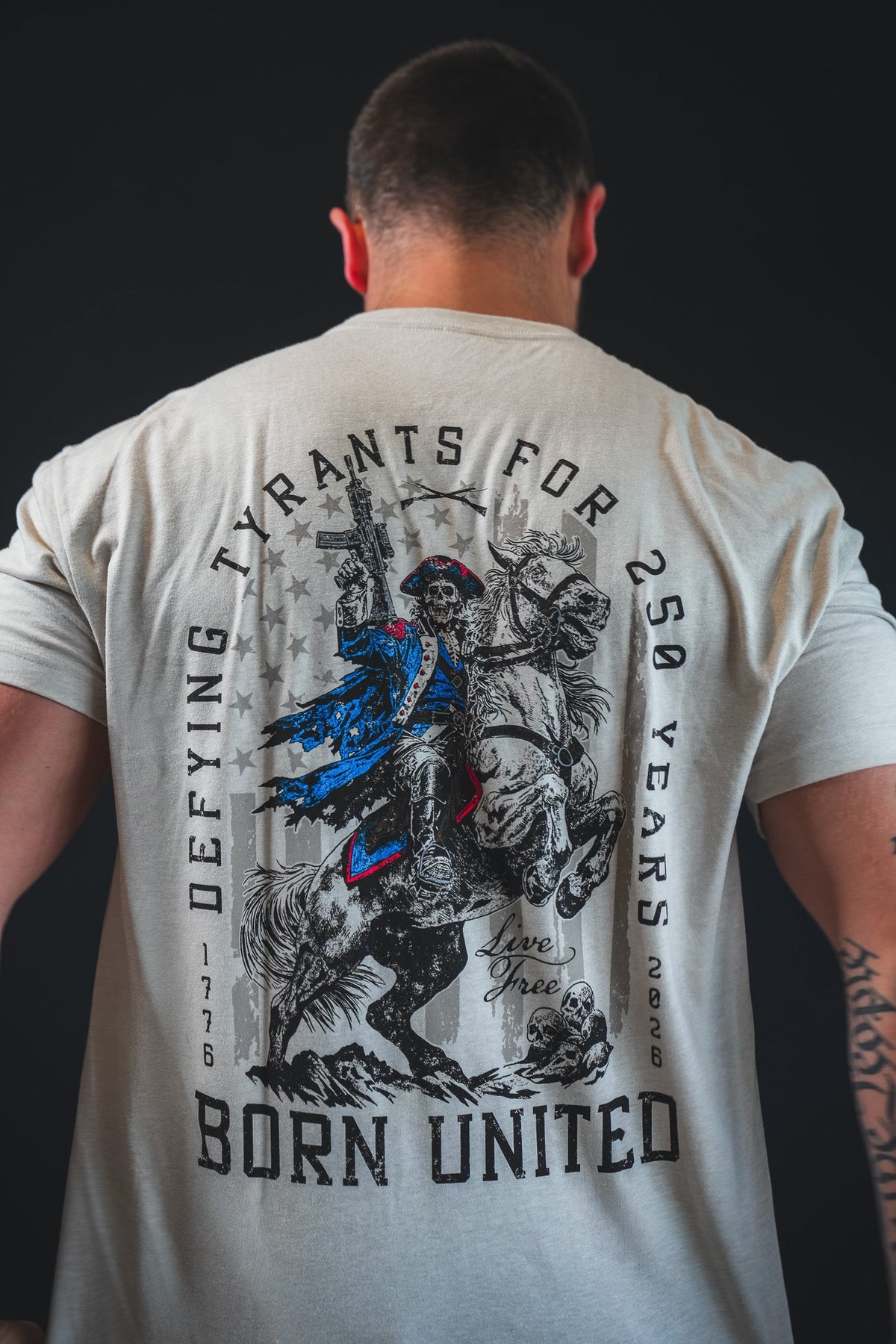 Light gray graphic back T-shirt with “Dieying Grants for U.S. Years” lettering