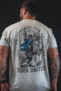Light gray graphic back T-shirt with horse-and-rider illustration and “Born United” text