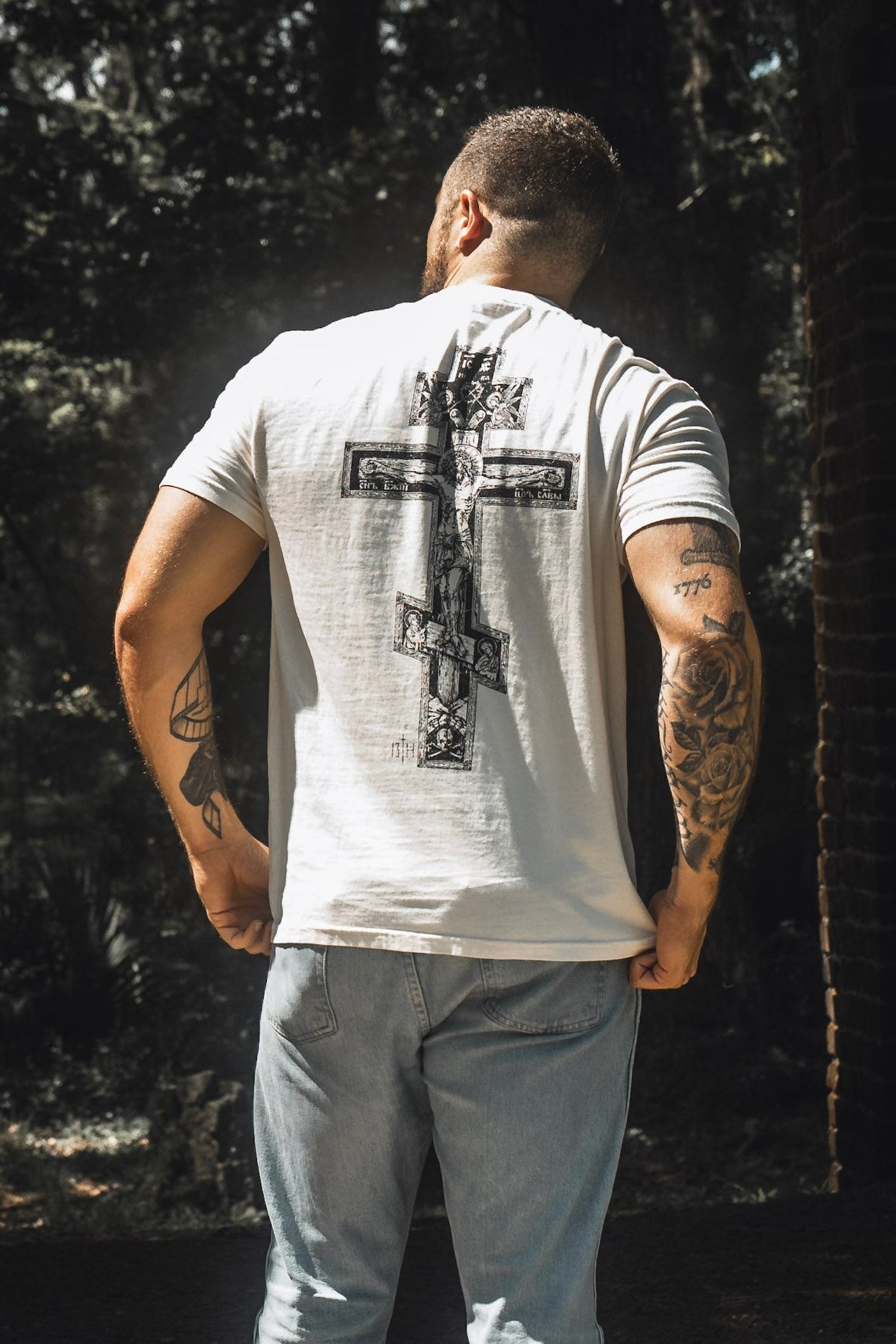 White premium tee back view with large cross graphic
