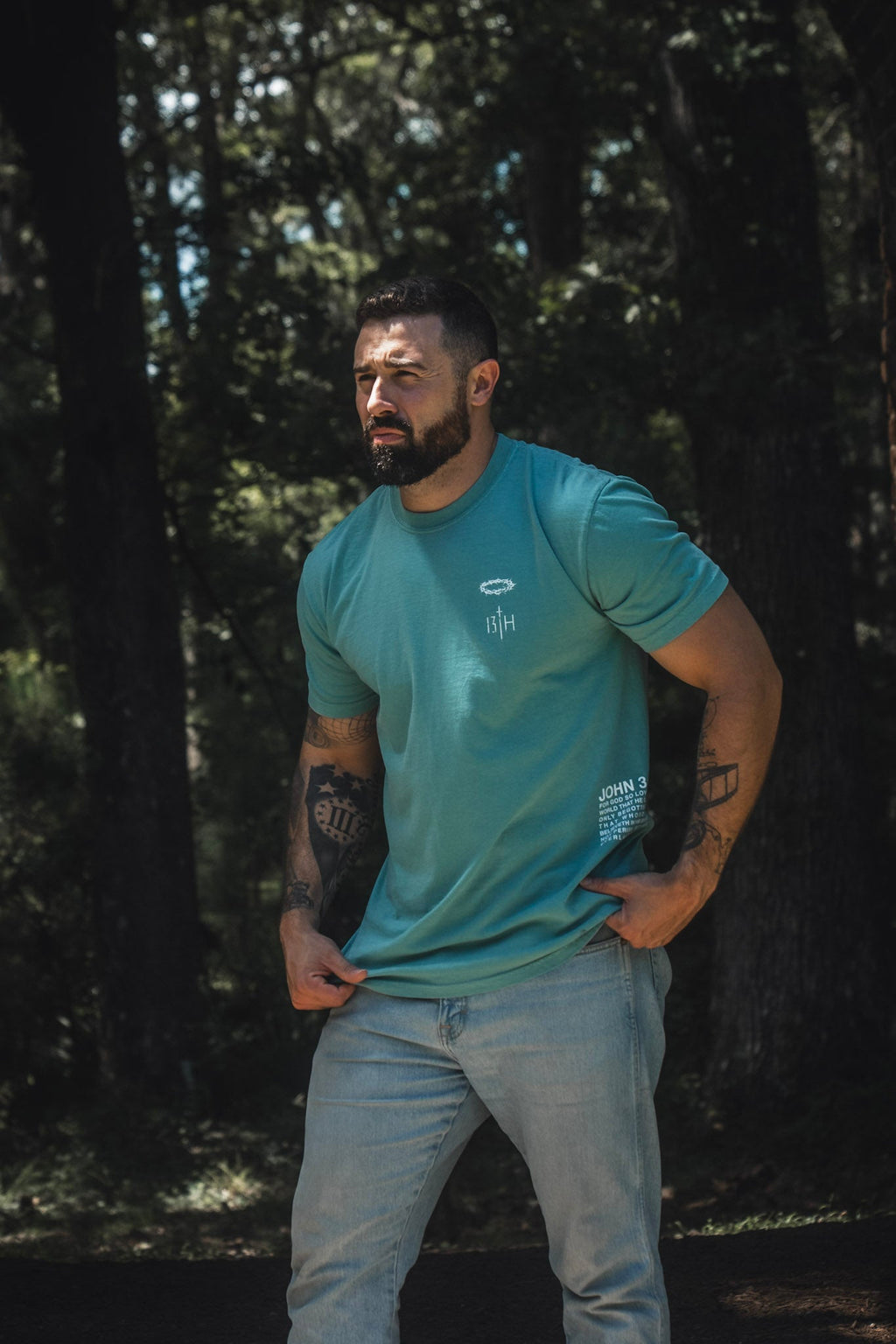 Seafoam premium T-shirt with small chest logo and faded vertical text