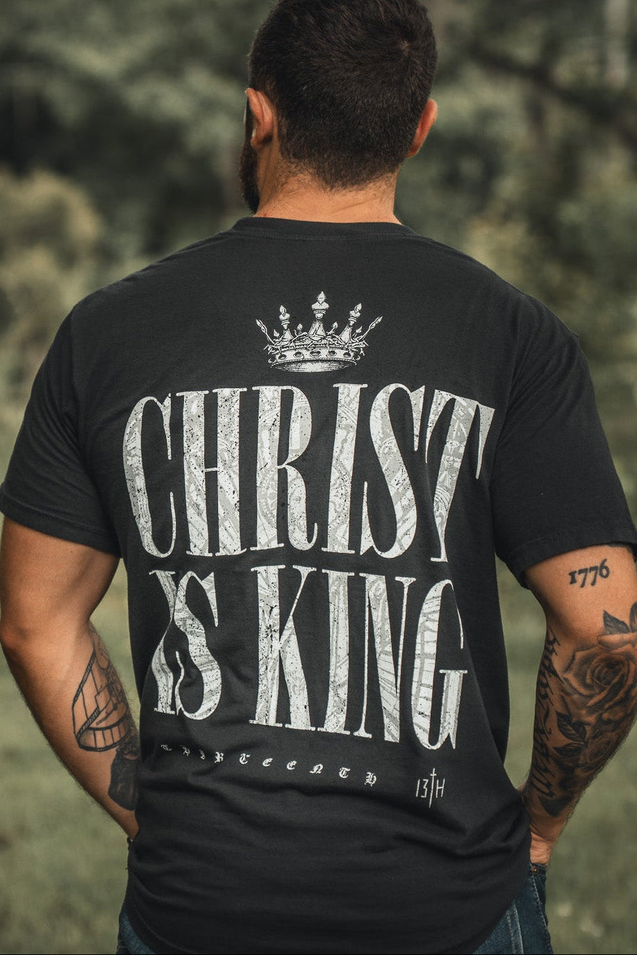Black T-shirt with large back graphic "CHRIST IS KING" and crown