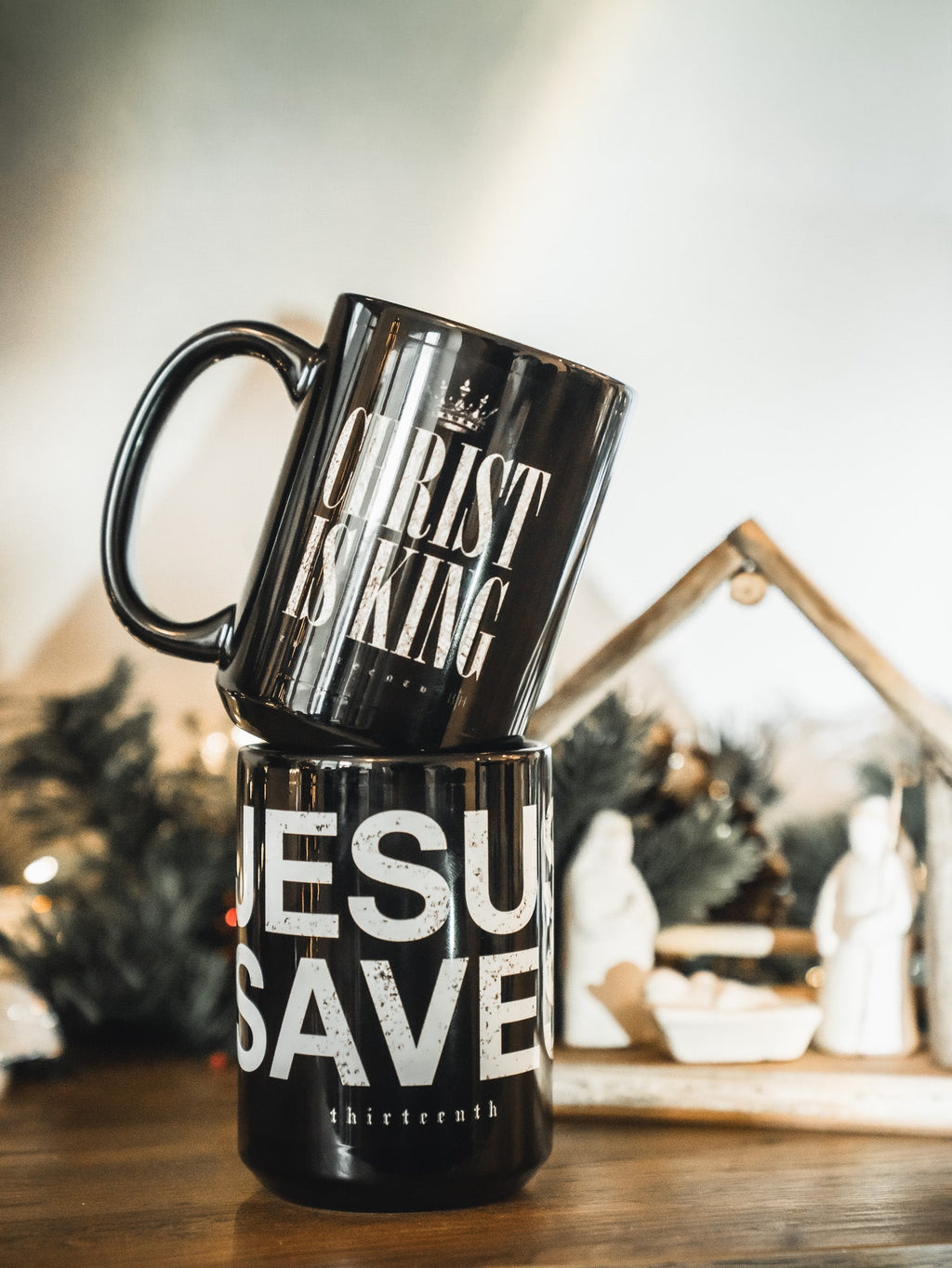 Black mug with 'CHRIST IS KING' top text and 'JESU SAVE' on the front