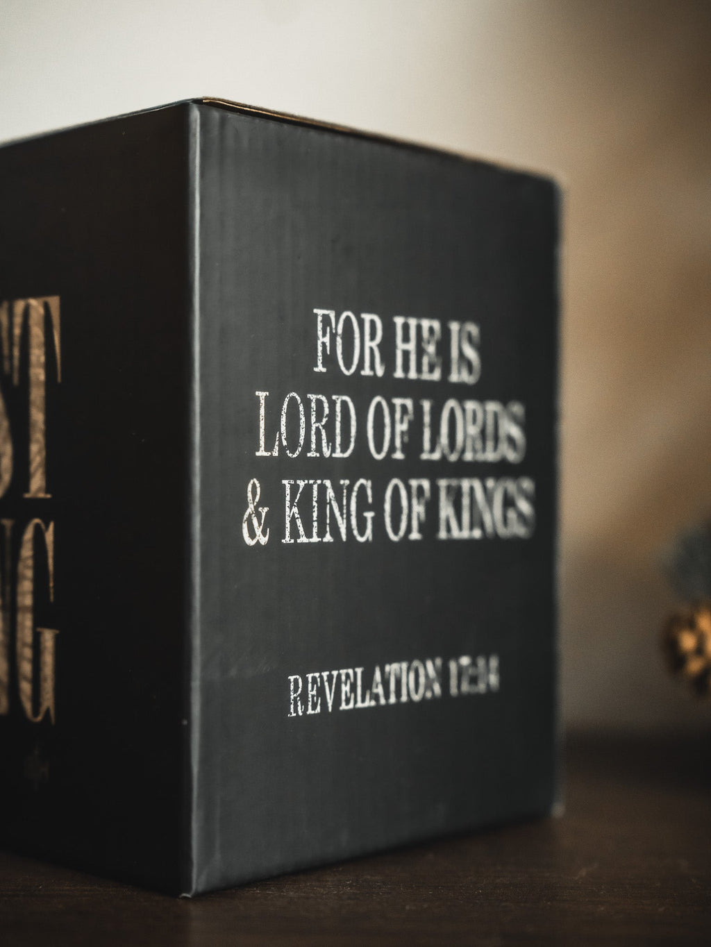 Black gift box panel reading FOR HE IS LORD OF LORDS & KING OF KINGS