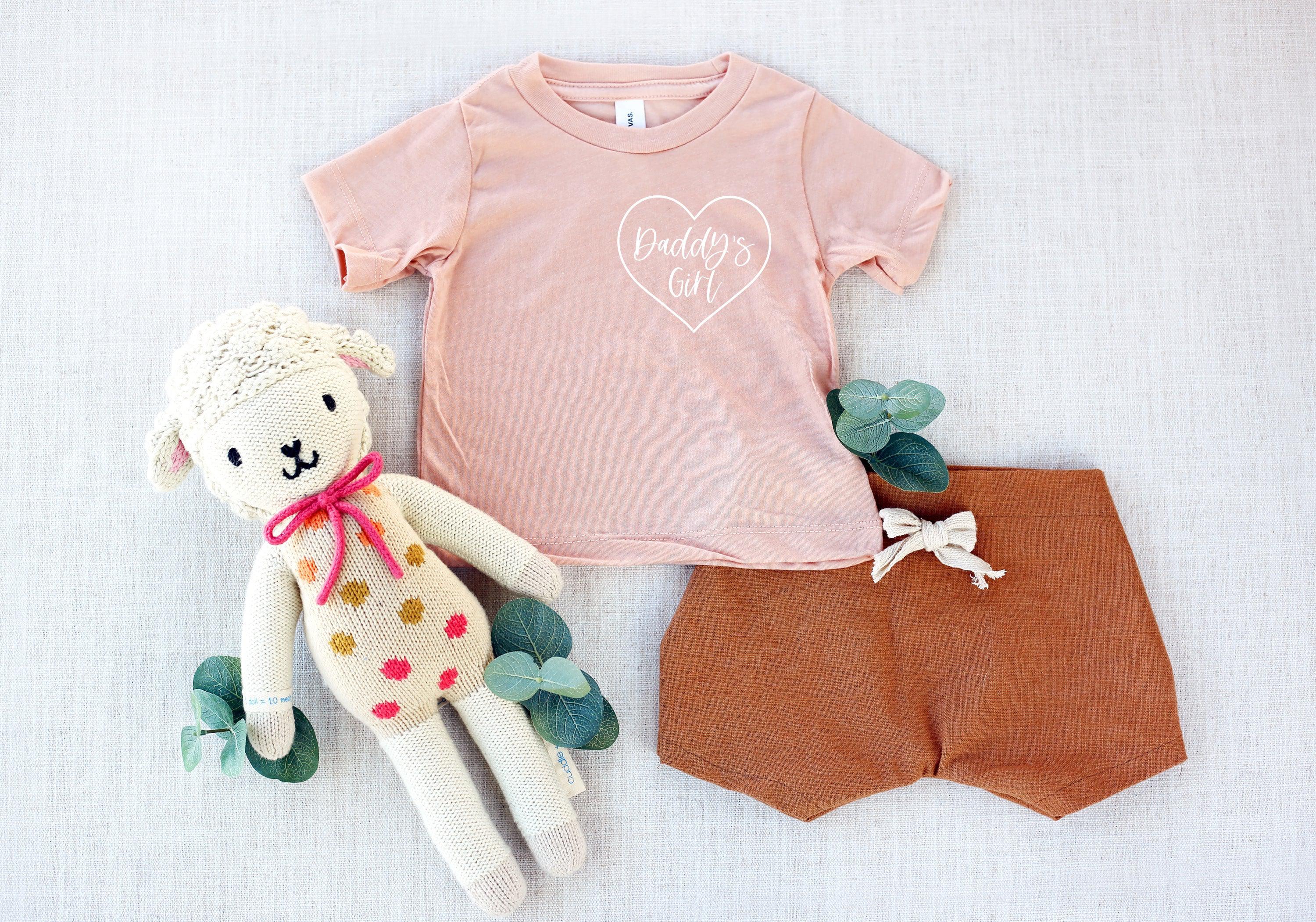 Light pink baby T-shirt with white 'Daddy's Girl' heart logo