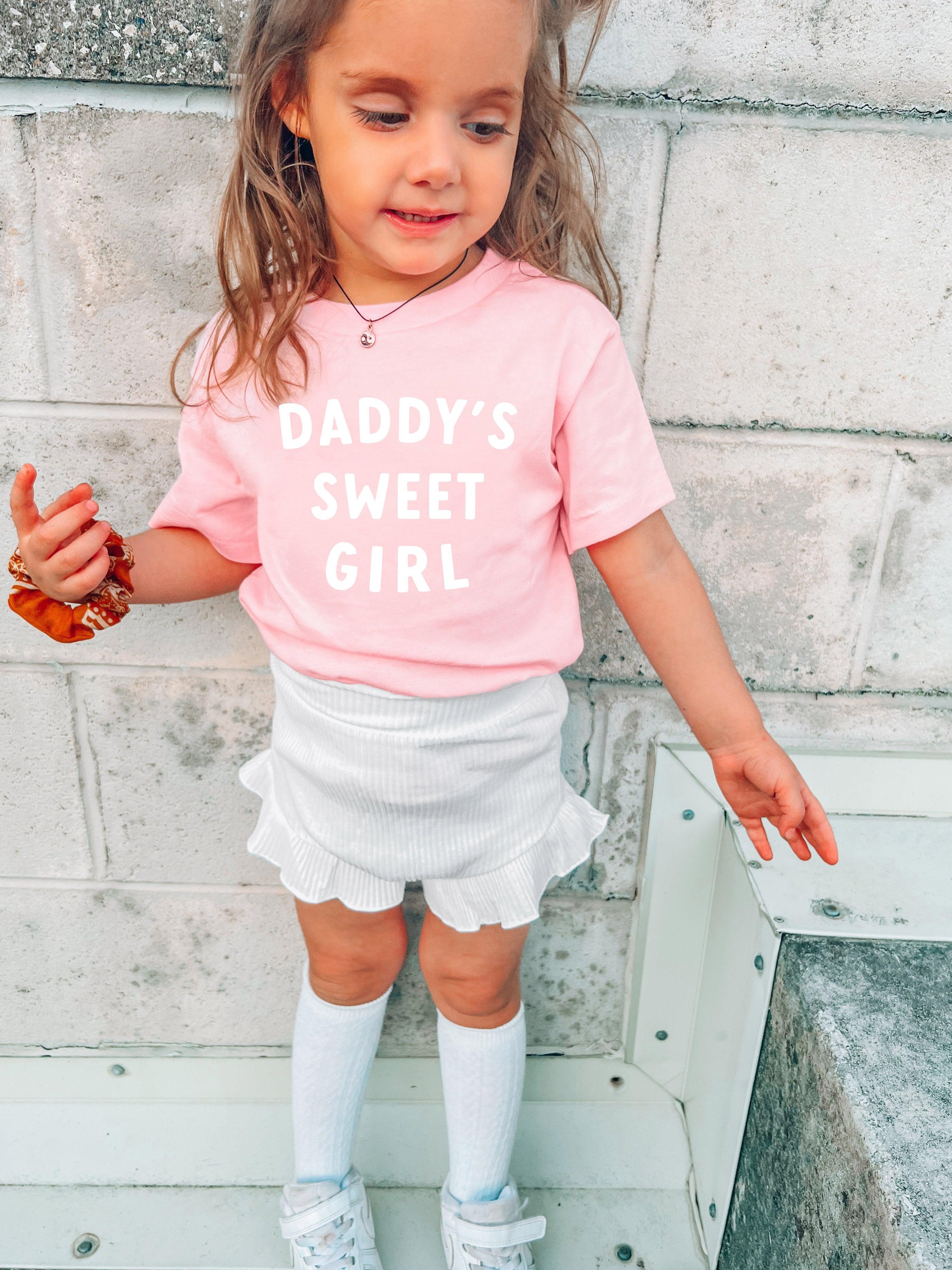 Baby and toddler T-shirt, light pink with “DADDY’S SWEET GIRL” text on front