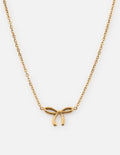 Gold bow pendant necklace with delicate chain and small dangling bow detail