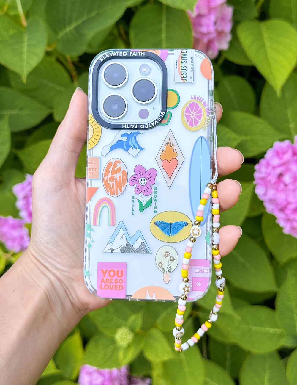 Beaded phone charm with star beads on colorful phone case