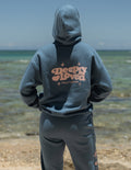 Blue unisex hoodie with hood, kangaroo pocket, and centered back logo graphic