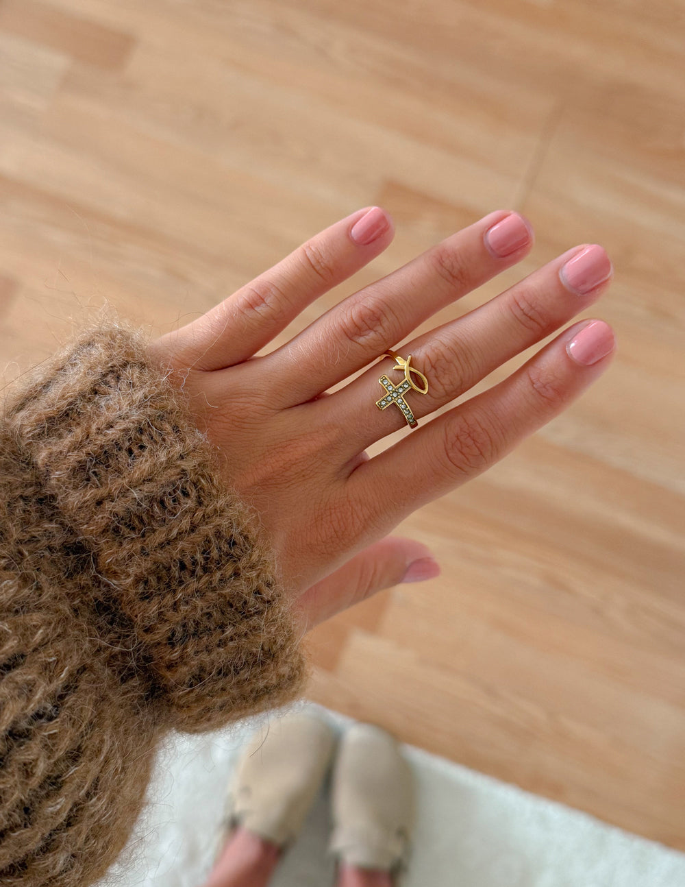 Gold-tone cross ring with clear stones on slim band