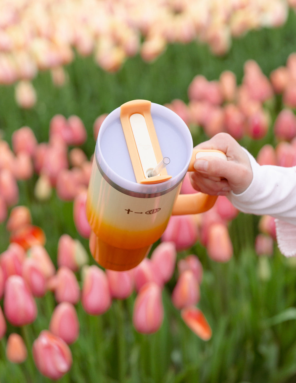 40 oz faith tumbler cup with orange lid accents and straw, logo on front