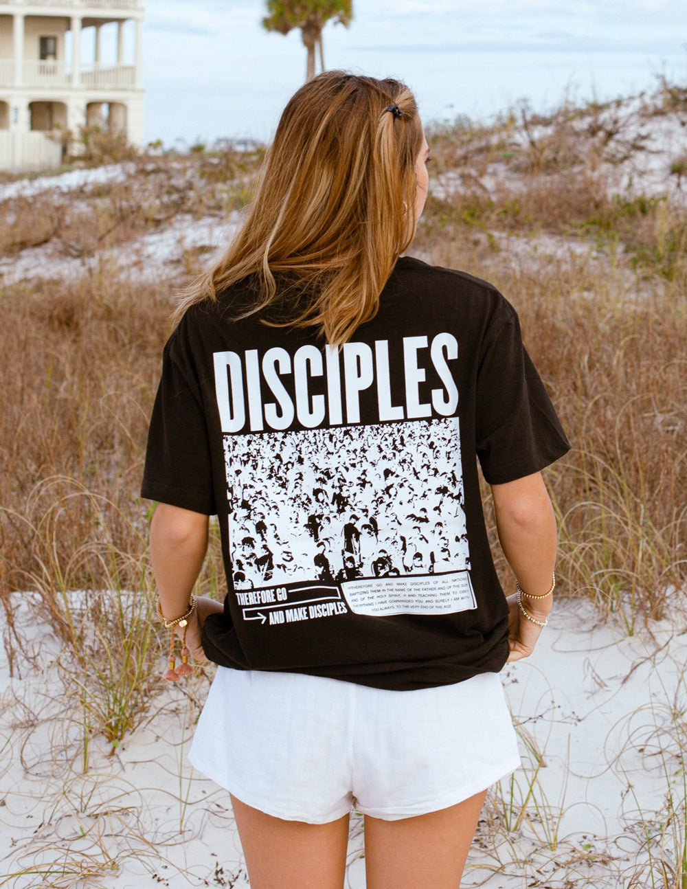 Unisex T-shirt, black, with large white DISCIPLES back graphic and photo-style print
